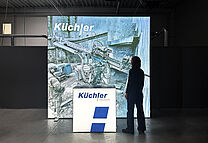 Küchler Technik AG - LED exhibition wall with illuminated counter Küchler Technik AG - LED exhibition wall with illuminated counter