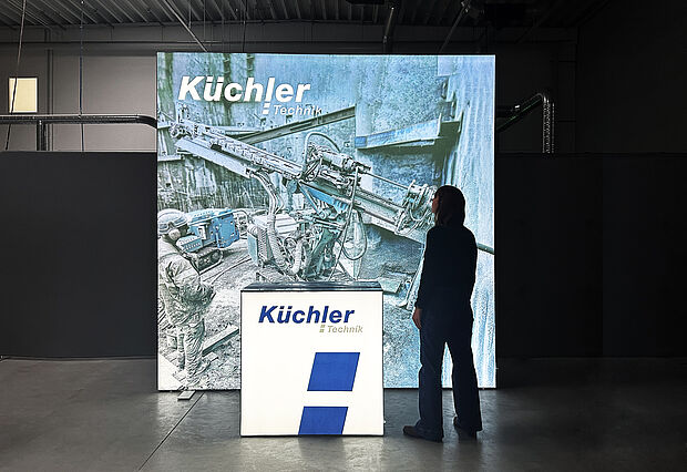 Küchler Technik AG - LED exhibition wall with illuminated counter Küchler Technik AG - LED exhibition wall with illuminated counter
